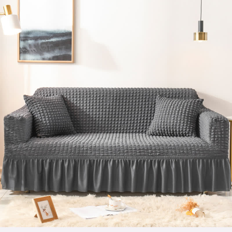 Elastischer Sofabezug mit Rüschen im schlichten Stil