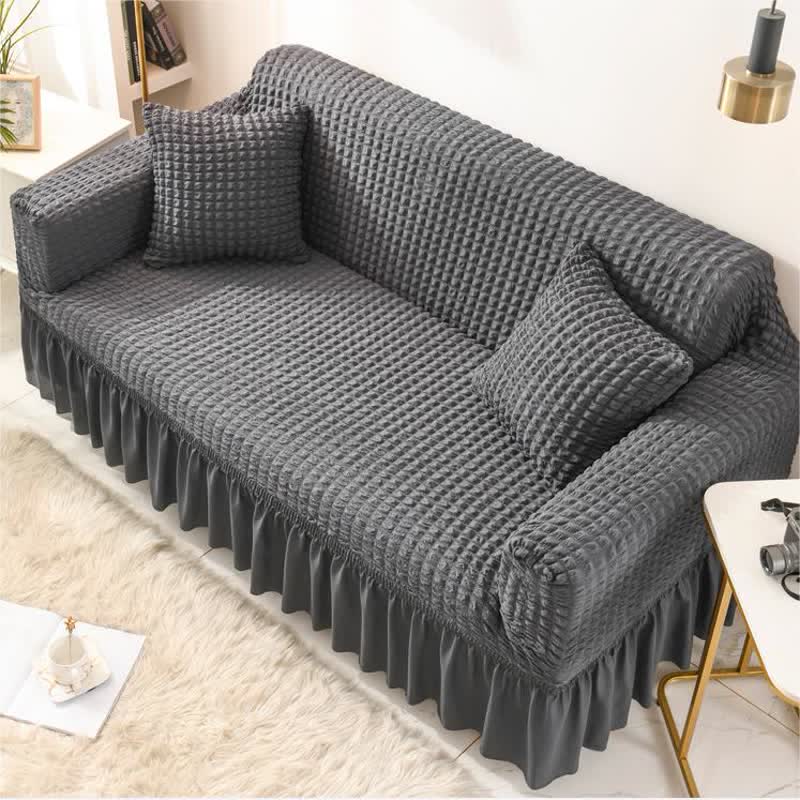 Elastischer Sofabezug mit Rüschen im schlichten Stil