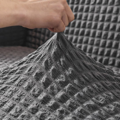 Elastischer Sofabezug mit Rüschen im schlichten Stil