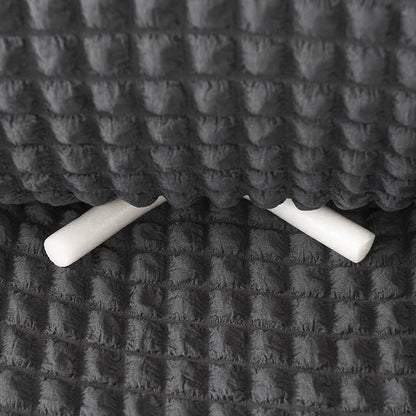 Elastischer Sofabezug mit Rüschen im schlichten Stil
