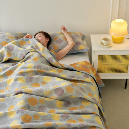 Wendesteppdecke aus Baumwollgaze-Jacquard mit Blättern