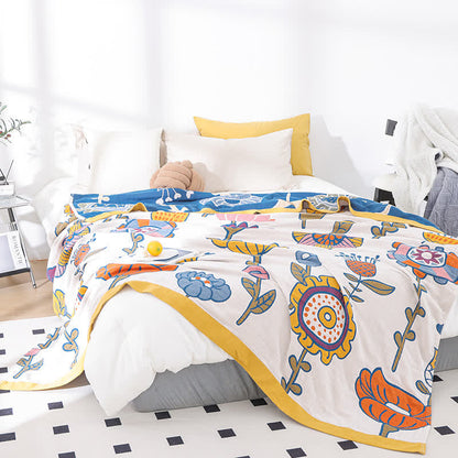 Steppdecke aus reiner Baumwollgaze mit Cartoon-Blumenmotiv