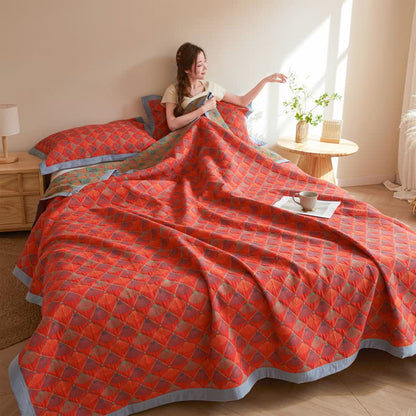 Elegante Steppdecke aus Baumwollgaze mit Pfauenschwanz