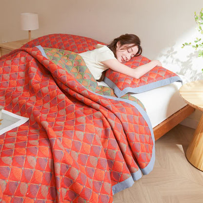 Elegante Steppdecke aus Baumwollgaze mit Pfauenschwanz