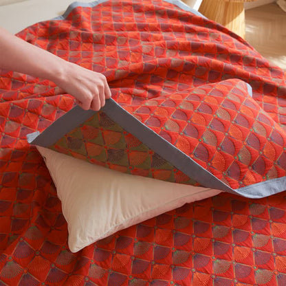 Elegante Steppdecke aus Baumwollgaze mit Pfauenschwanz