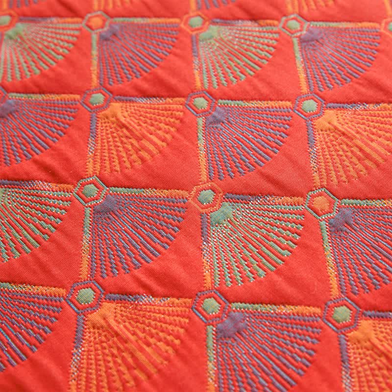 Elegante Steppdecke aus Baumwollgaze mit Pfauenschwanz