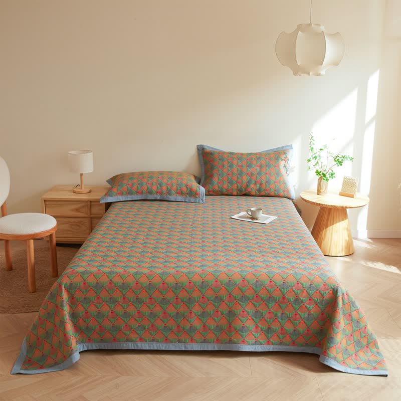 Elegante Steppdecke aus Baumwollgaze mit Pfauenschwanz