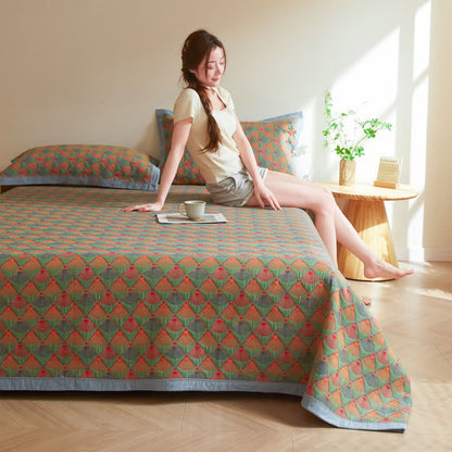 Elegante Steppdecke aus Baumwollgaze mit Pfauenschwanz