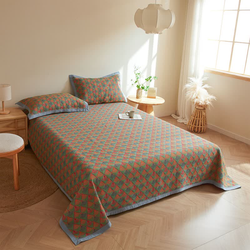 Elegante Steppdecke aus Baumwollgaze mit Pfauenschwanz