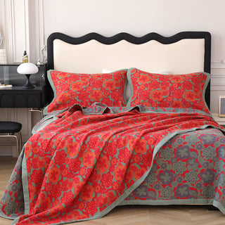 Wendbare Steppdecke aus reiner Baumwolle mit elegantem Blumenmuster