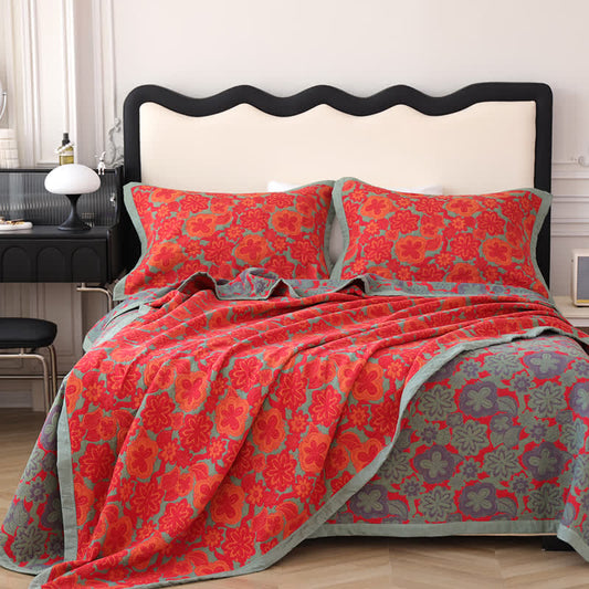 Wendbare Steppdecke aus reiner Baumwolle mit elegantem Blumenmuster