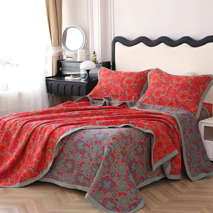 Wendbare Steppdecke aus reiner Baumwolle mit elegantem Blumenmuster