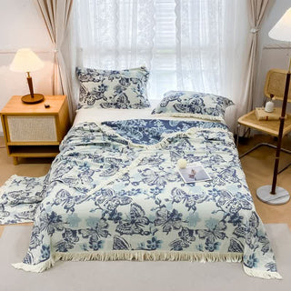 Leichte Steppdecke mit Quasten und Schmetterlingsmotiv aus Baumwollgaze