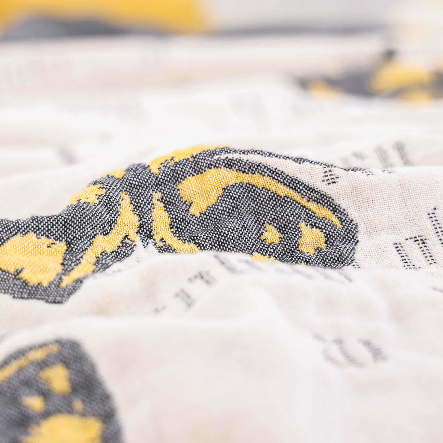 Steppdecke aus Baumwollgaze-Jacquard mit Schmetterlingsquasten