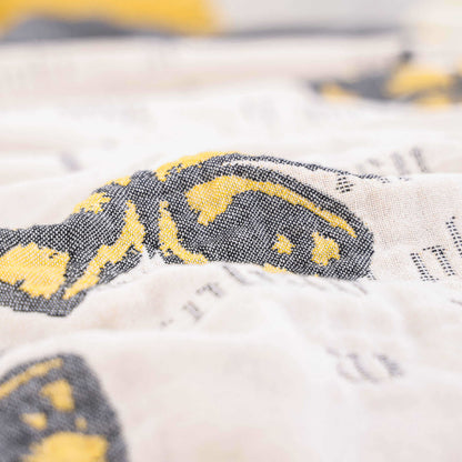 Steppdecke aus Baumwollgaze-Jacquard mit Schmetterlingsquasten
