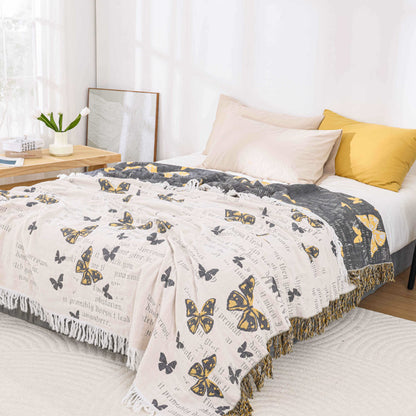 Steppdecke aus Baumwollgaze-Jacquard mit Schmetterlingsquasten