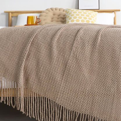 Ownkoti – Schlichte, einfarbige Strickdecke mit Quasten
