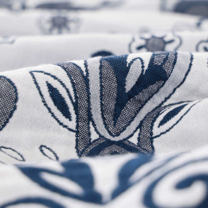 Leichte Steppdecke aus Baumwolle mit Retro-Paisleymuster und Quasten