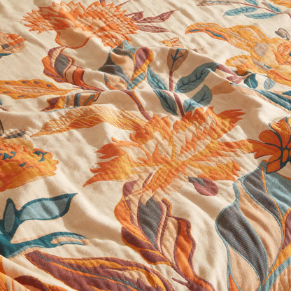 Steppdecke aus reiner Baumwolle mit Blumenmuster und Quasten