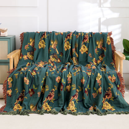 Wendesteppdecke aus Baumwolle mit Blumenmuster und Quasten „Magpie“