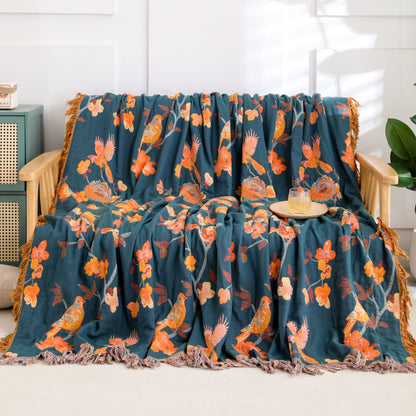 Wendesteppdecke aus Baumwolle mit Blumenmuster und Quasten „Magpie“