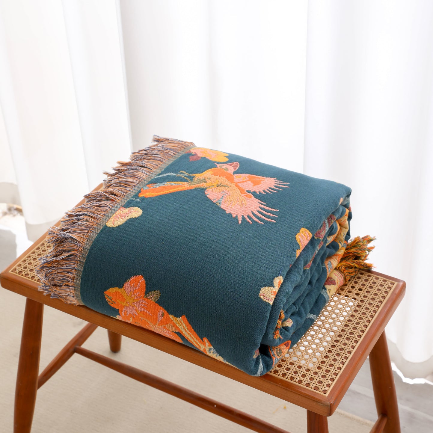 Wendesteppdecke aus Baumwolle mit Blumenmuster und Quasten „Magpie“
