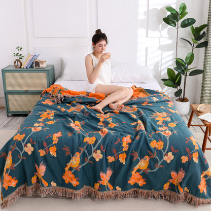 Wendesteppdecke aus Baumwolle mit Blumenmuster und Quasten „Magpie“