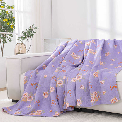 Steppdecke aus Baumwollgaze mit Schleife und Rose