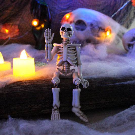 Halloween Skelett-Ornament aus Kunstharz mit winkender Hand
