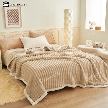 Fleecedecke mit Jacquard-Wellenstruktur