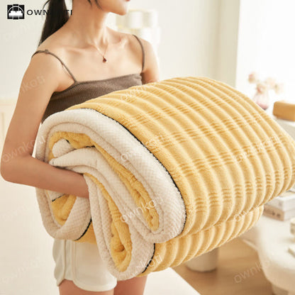 Fleecedecke mit Jacquard-Wellenstruktur