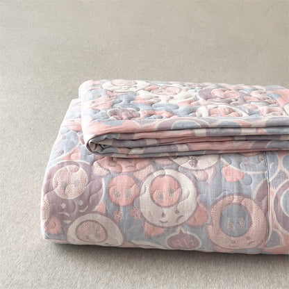 Gesteppte Bettdecke aus Baumwollgaze mit Cartoon-Schweinchen