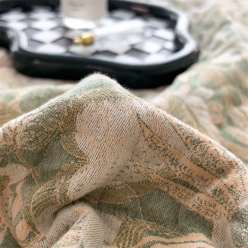 Gesteppte Tagesdecke aus Baumwollgaze mit Jacquard-Blumenmuster