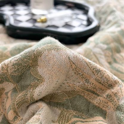 Gesteppte Tagesdecke aus Baumwollgaze mit Jacquard-Blumenmuster