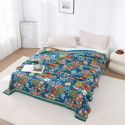 Weiche Decke aus Baumwollgaze mit leuchtenden Blumen