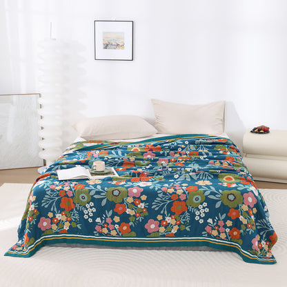 Weiche Decke aus Baumwollgaze mit leuchtenden Blumen