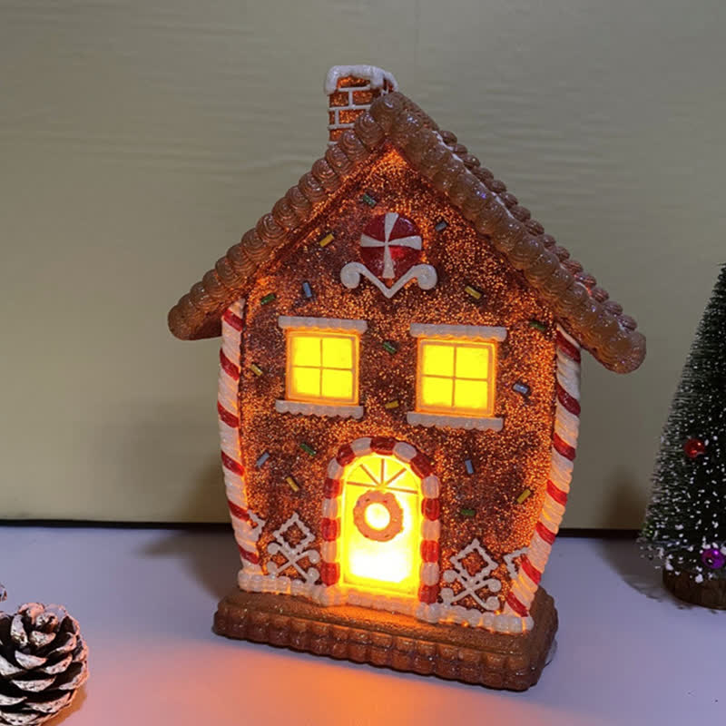 Leuchtendes Lebkuchenhaus-Ornament für Weihnachten