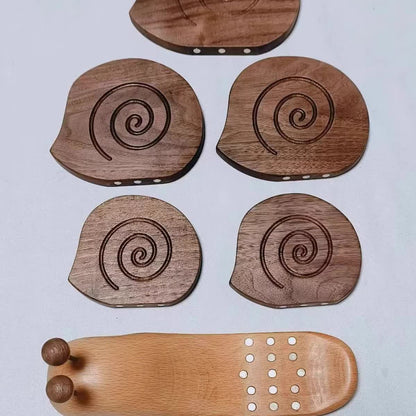 Kreativer Untersetzer in Schneckenform aus Massivholz