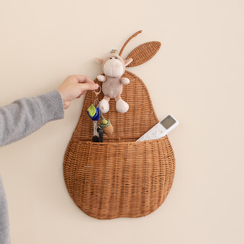 Wandkorb aus geflochtenem Rattan in Obstform