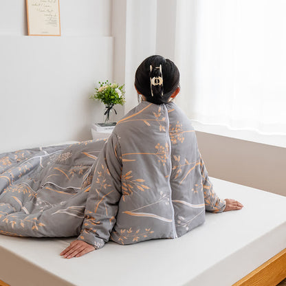 Tragbare Steppdecke mit pastoralem Kissen und Ärmeln