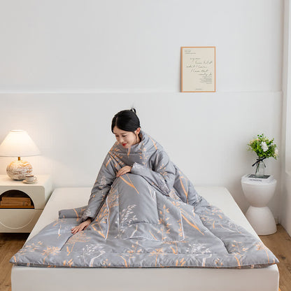 Tragbare Steppdecke mit pastoralem Kissen und Ärmeln