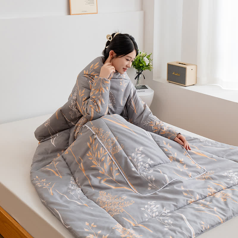 Tragbare Steppdecke mit pastoralem Kissen und Ärmeln