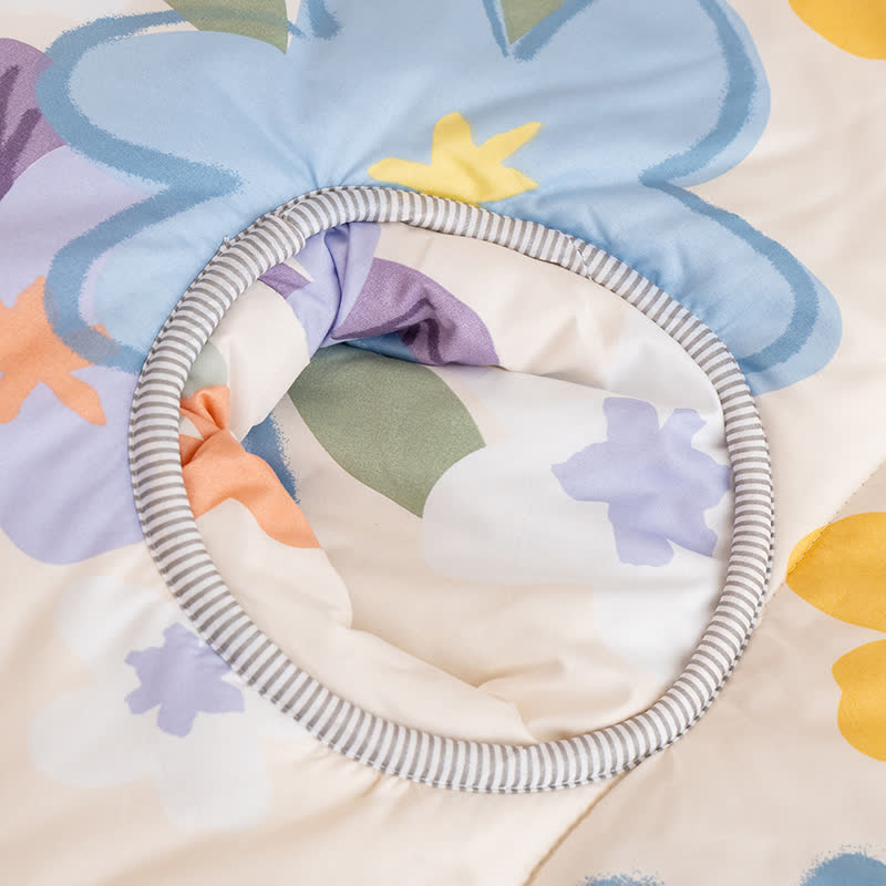 Tragbare Steppdecke mit floralem Muster