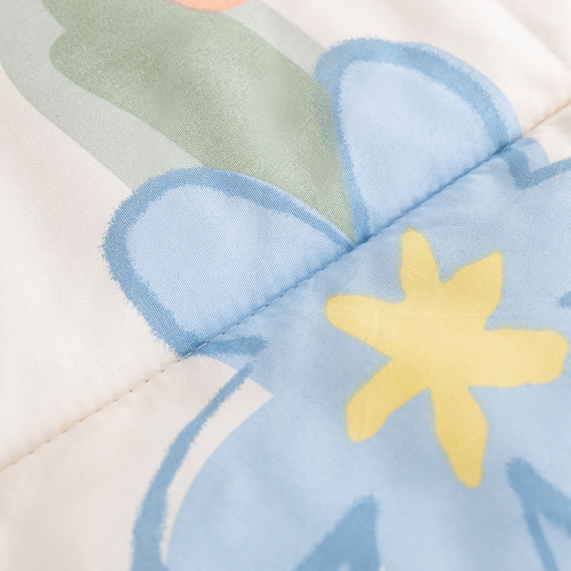 Tragbare Steppdecke mit floralem Muster