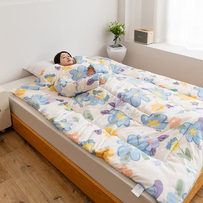 Tragbare Steppdecke mit floralem Muster