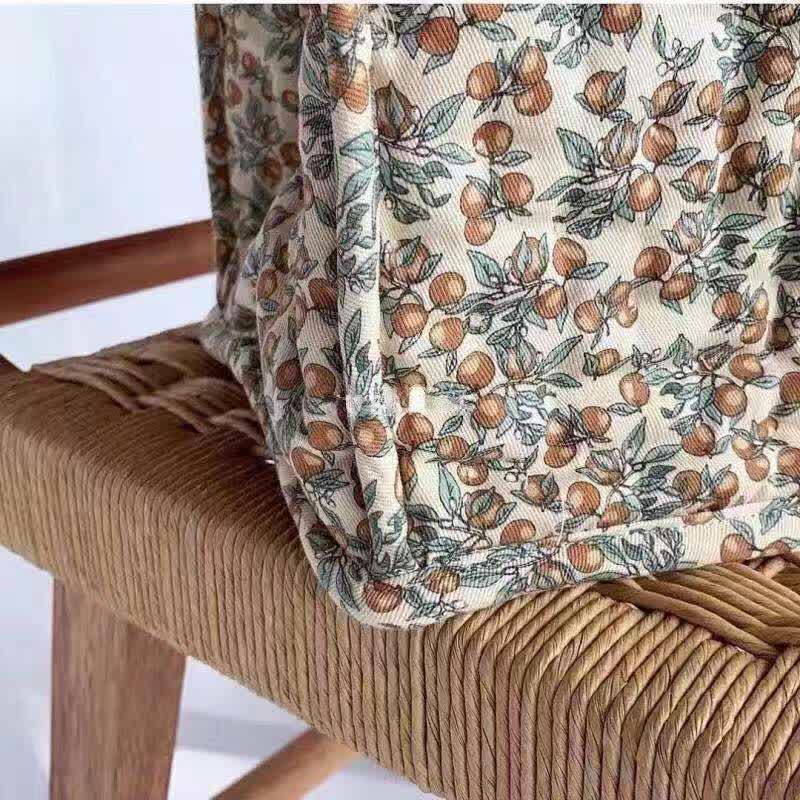 Aufbewahrungskorb aus reiner Baumwolle mit Blumenmuster und Griffen