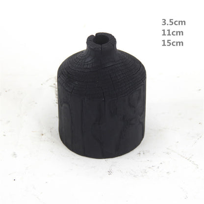 Hölzerne schwarze Vase Kunst dekorative Ornament