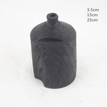 Hölzerne schwarze Vase Kunst dekorative Ornament