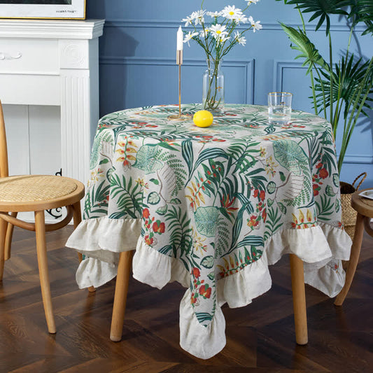 Runde Tischdecke mit Rüschen und grünem Pflanzendruck im Pastoralstil