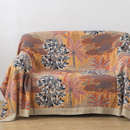 Kuscheldecke aus Baumwollgaze mit tropischem Dschungelmotiv